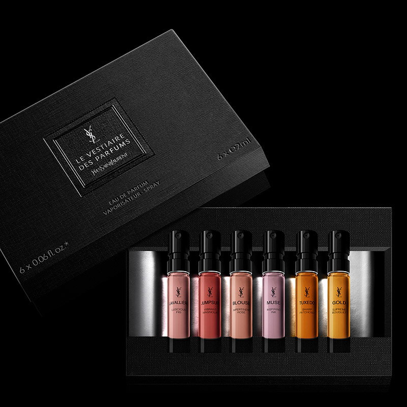 A luxury black textured discovery set from YSL "Le Vestiaire des Parfums" containing six colorful fragrance miniatures.