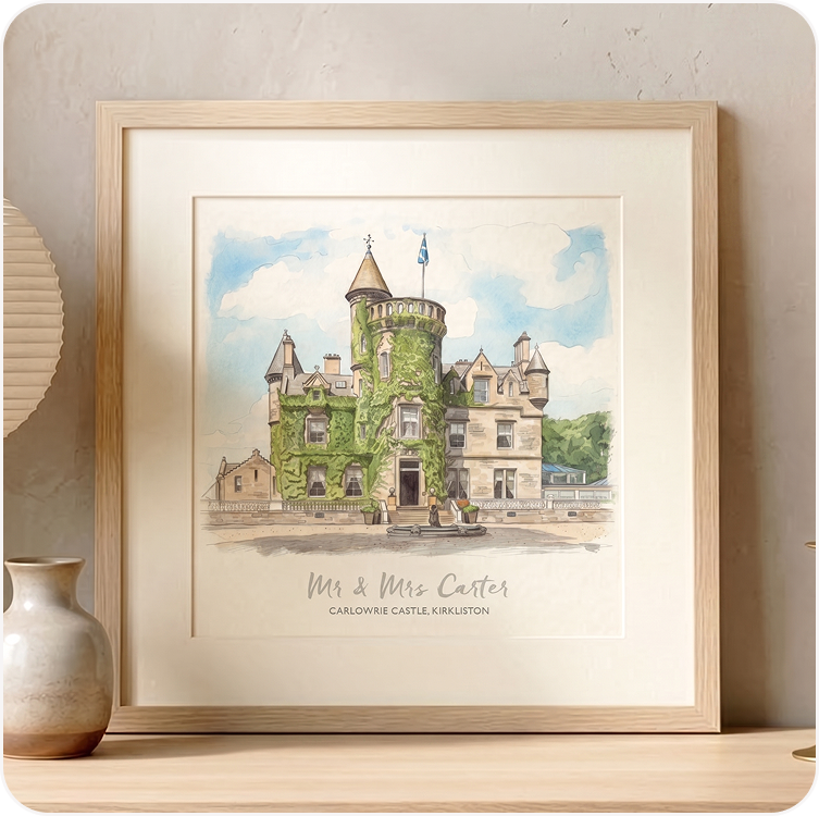 A framed watercolour illustration of a castle wedding venue, personalised with the couple's names beneath.
