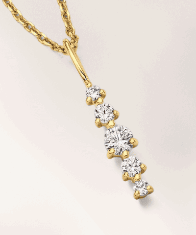 Drop pendant featuring a line of diamonds. 