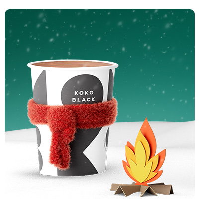 Hot Chocolate in a takeaway cup with a scarf on