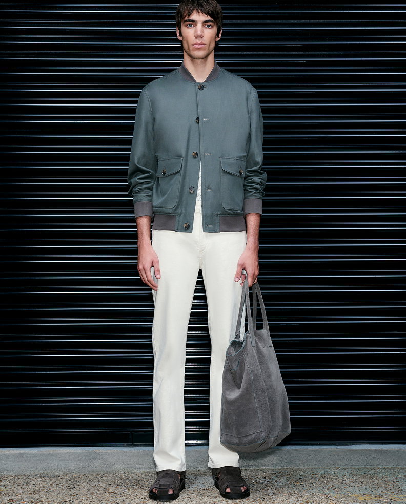 Man wearing a Dark Olive Cotton Linen Blend Bomber and Ecru Straight Fit Stretch Jeans
