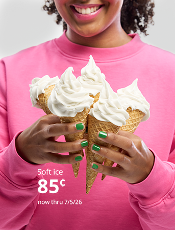 person holding a bunch of soft ice on cones.