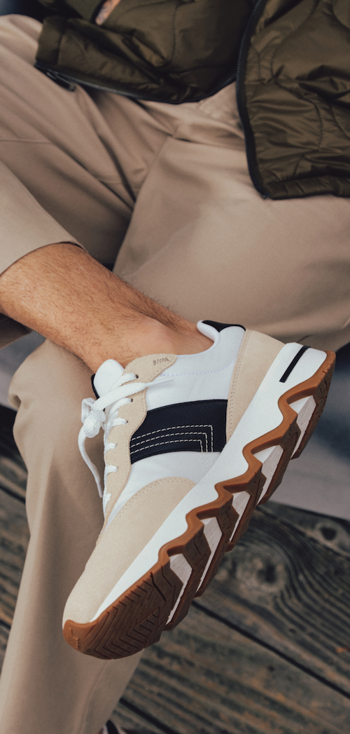 Kinetic™ Ember Men's Sneaker photographed on model
