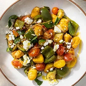 Crispy Pan-Fried Gnocchi with Cherry Tomatoes, Zucchini, and Feta