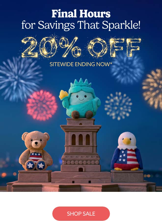 USA Warmies on statue podiums under fireworks. Shop Sale.