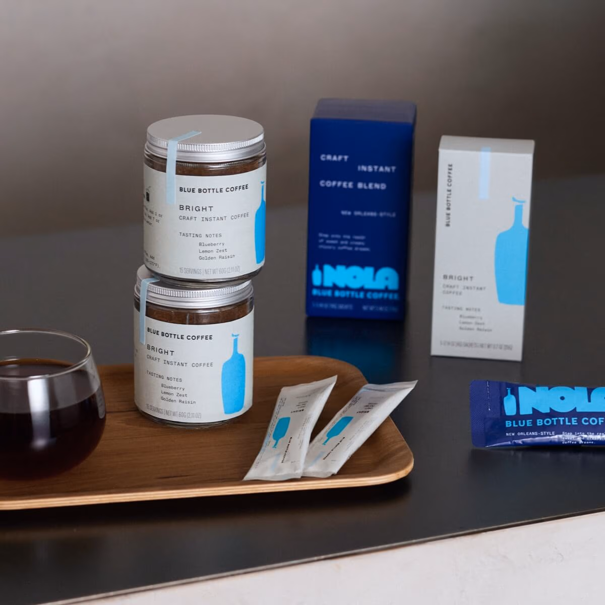 Image of coffee containers and coffee cups.