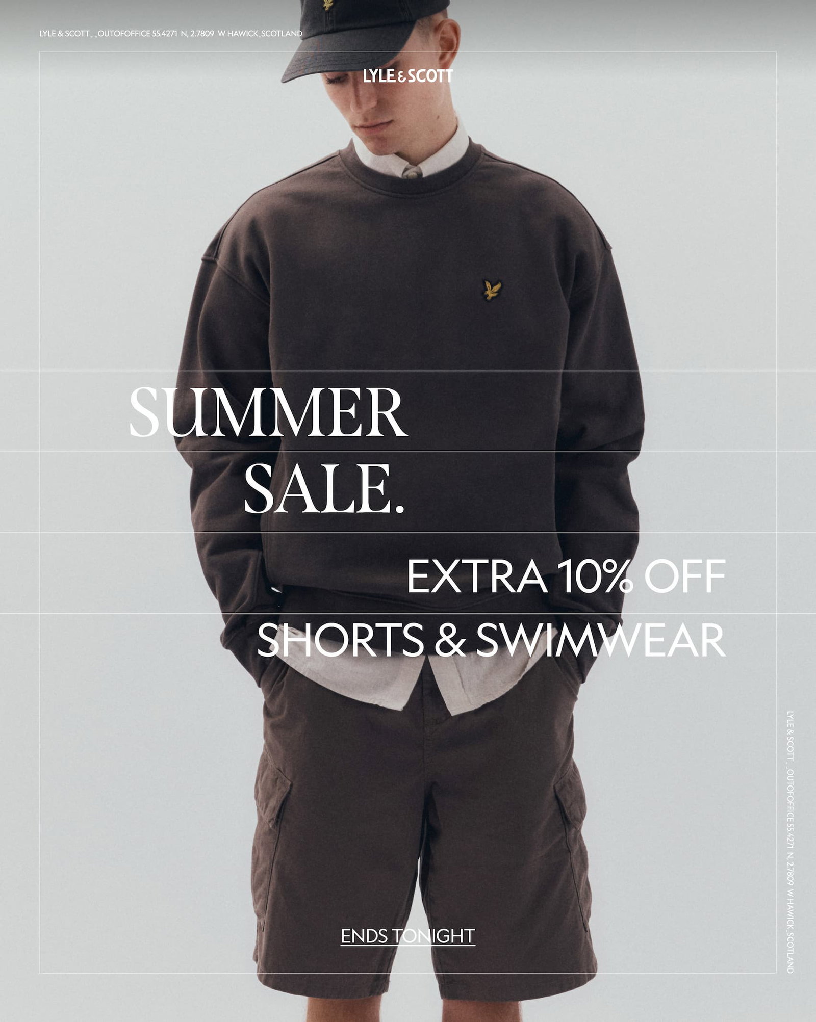 Model wearing shorts and sweatshirt