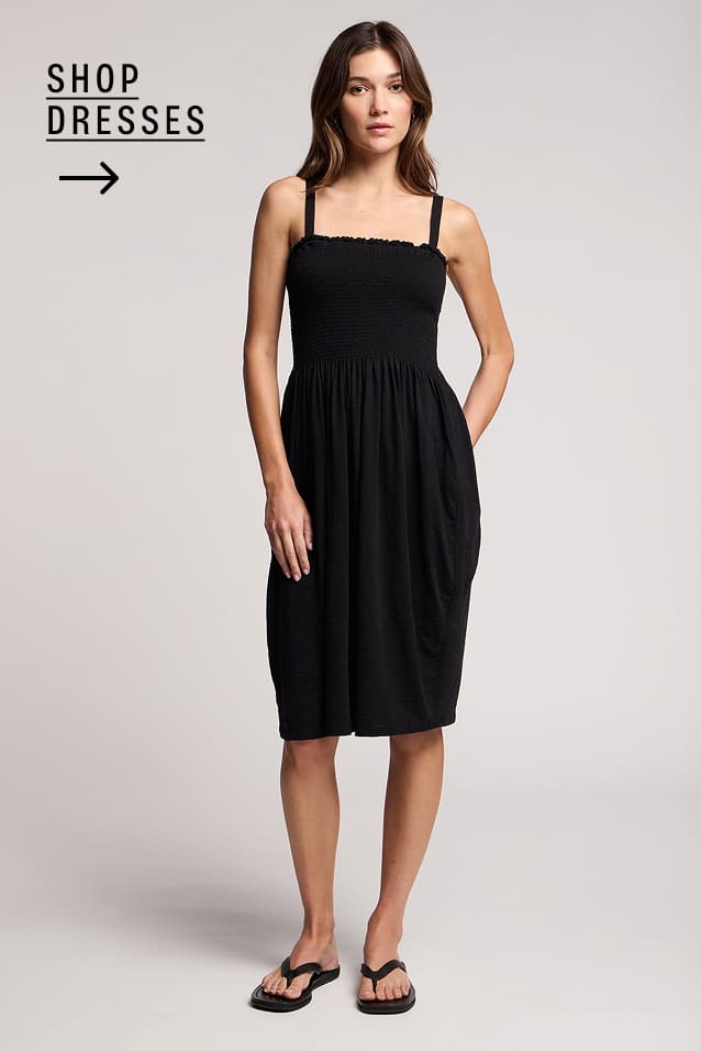 Image shows a model wearing the Cressida Dress. Text Reads : Shop Womens