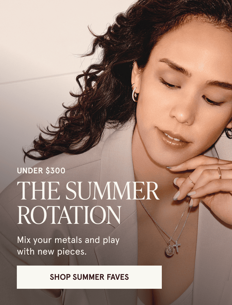 A model wearing gold, white metal and diamond jewelry. Mix your metals. Styles under $300. Click here to shop summer faves