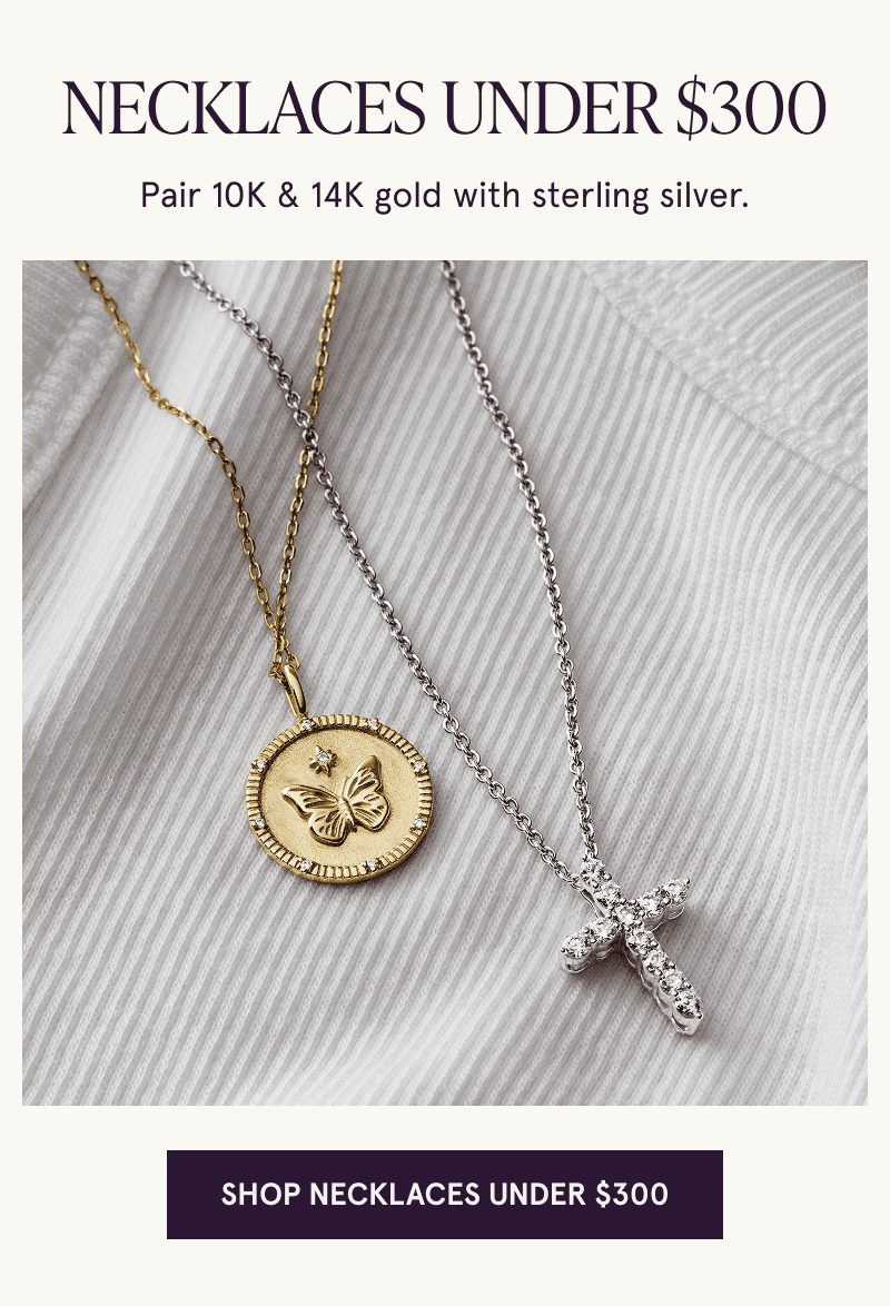 A gold butterfly pendant and a silver diamond cross pendant. Pair gold with silver. Click here to shop necklaces under $300