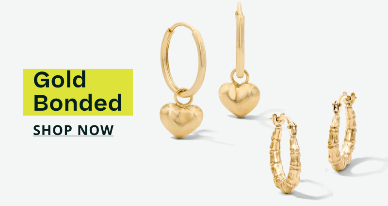 Gold-colored dangling heart & textured huggies. Gold Bonded. Click here to shop now