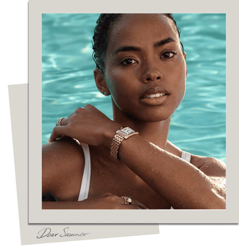 Model in a pool wearing gold and various jewelry. Heatwave Hits. Splash into style. Click to Shop Hot Summer Looks