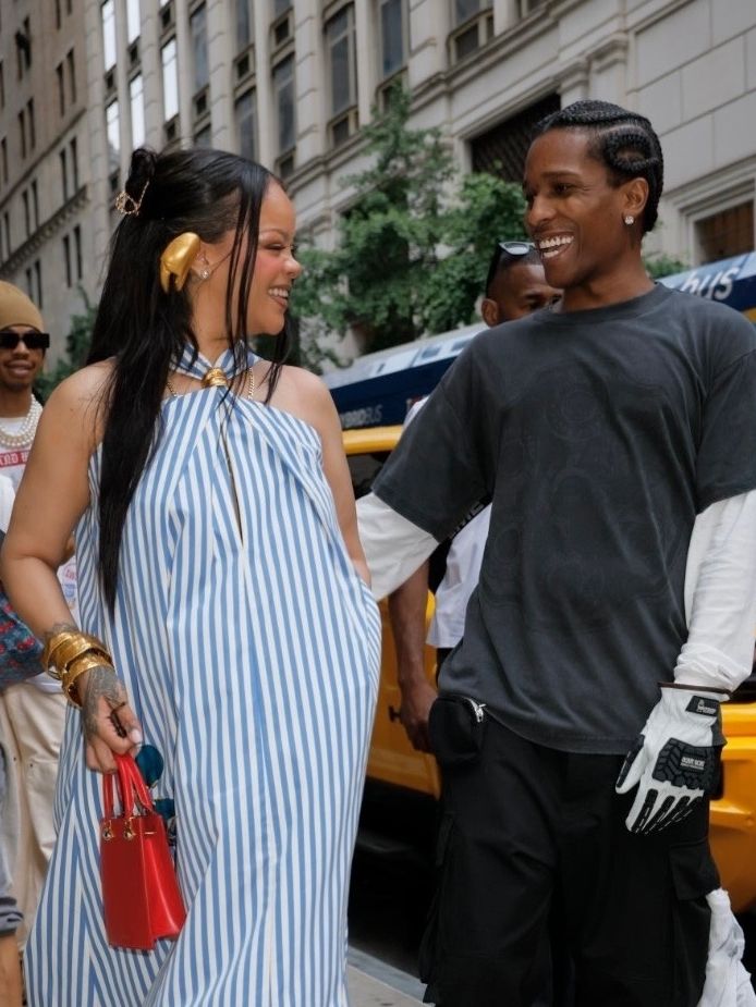 EXCLUSIVE Manhattan, NY Rihanna and ASAP Rocky were spotted outside the Four Seasons Hotel before hopping into a red Ferrari. Rihanna paired a blue-and-white striped maxi dress with white sneakers, while A$AP Rocky wore an oversized dark T-shirt, black cargo pants and racing-style gloves. Pictured: Rihanna, ASAP Rocky BACKGRID USA 5 JULY 2026 BYLINE MUST READ: Jairo / BACKGRID USA: +1 310 798 9111 / usasales@backgrid.com UK: +44 208 344 2007 / uksales@backgrid.com UK Clients - Pictures Containing Children Please Pixelate Face Prior To Publication