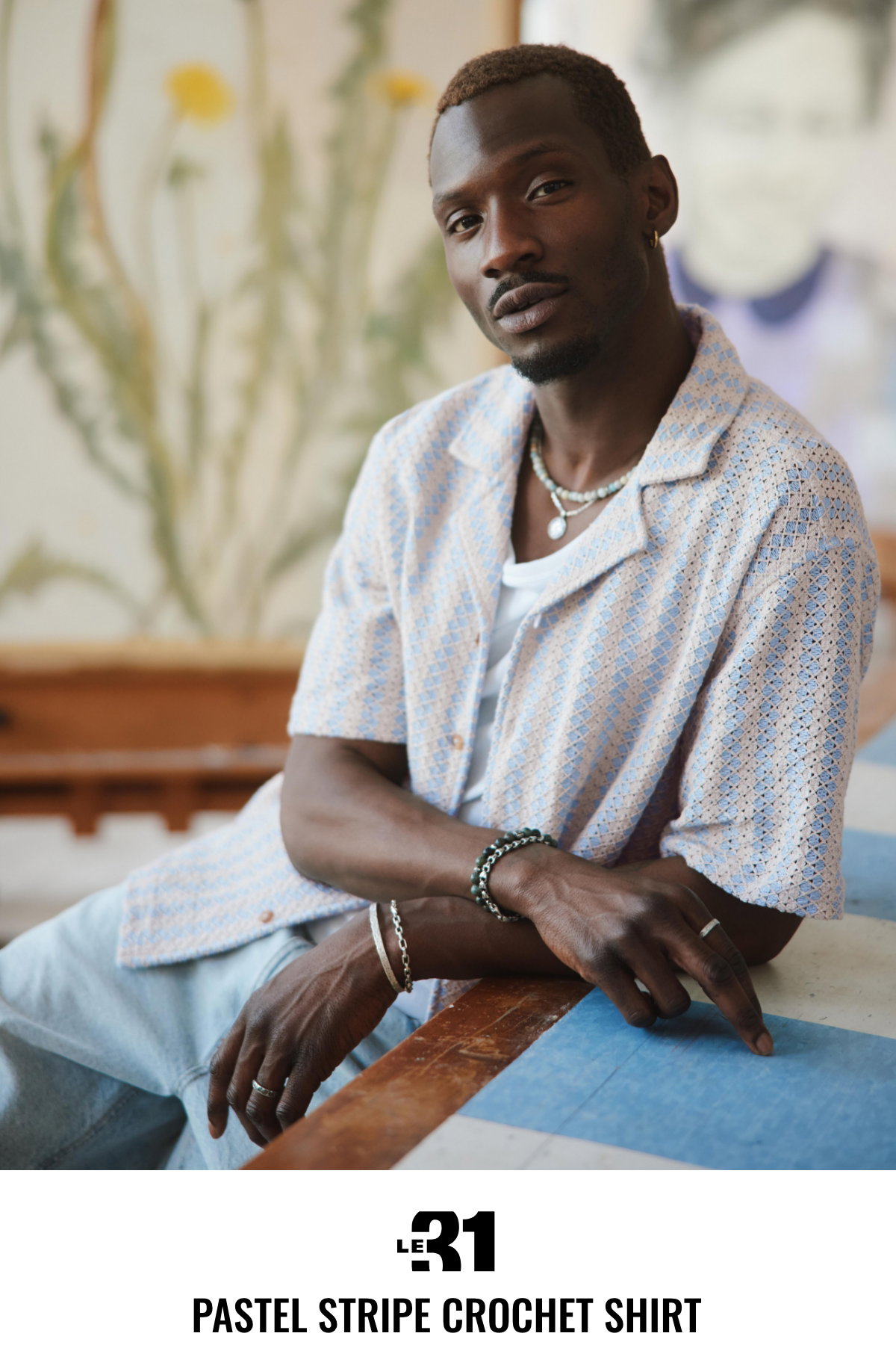  Man wearing a Pastel Stripe Crochet Shirt.
