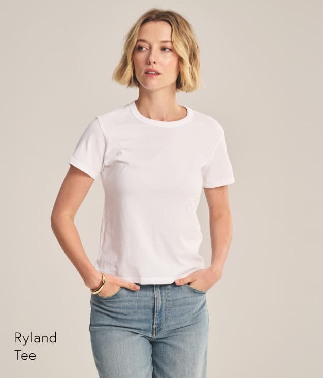 Image shows a model wearing the Ryland Top in White. Text Reads: Ryland Tee