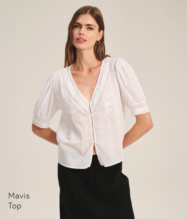 Image shows a model wearing the Mavis Top in White. Text Reads: Mavis Top.