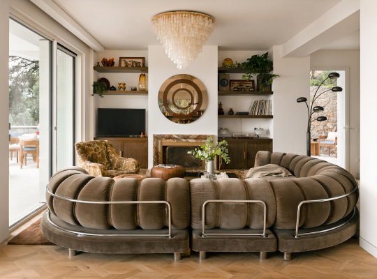 A villa living room with modern fixtures and furniture.