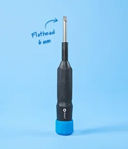 The Megalodon driver standing upright on a light blue background.
The animation shows the switch to each extended bit with a blue handwritten arrow and label pointing to the bit at the top.
