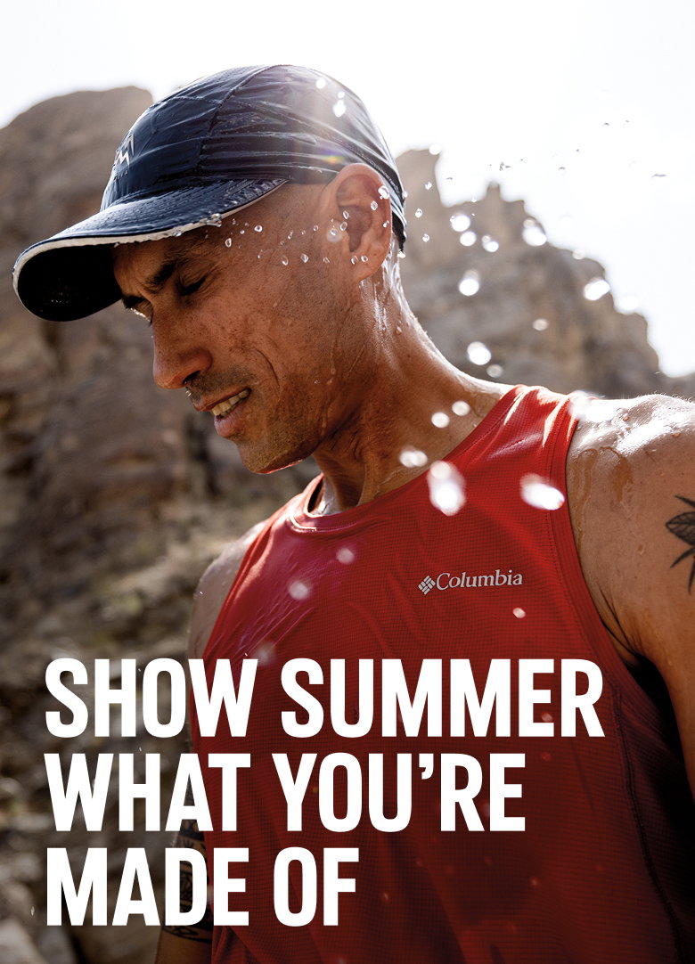 A runner splashing himself with water in the desert. SHOW SUMMER WHAT YOU'RE MADE OF