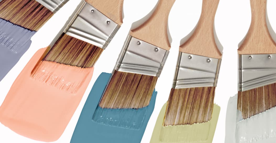 Wet paint brushes featuring purple paint color Cosmic Vibes, coral paint color Pop, sky blue paint color Blue Ivy, melon paint color High Vibe, and gray paint color Seize The Gray
