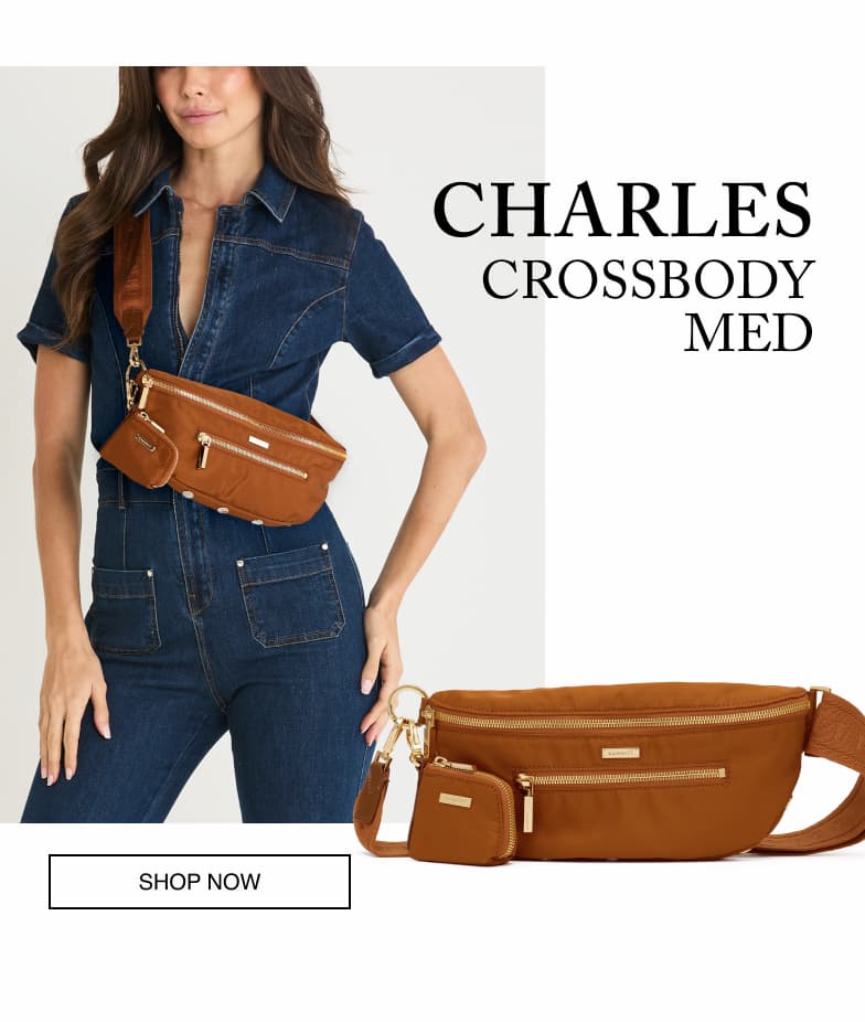 Model wearing the Hammitt Charles Crossbody Med in Amber Italian nylon with a front product view.