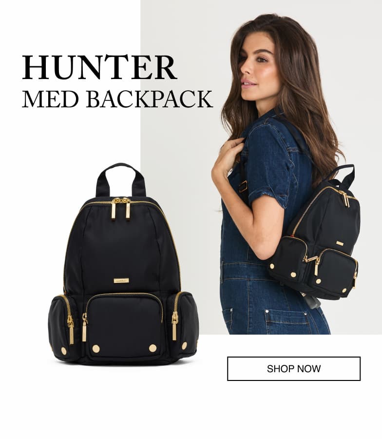 Model wearing the Hammitt Hunter Med Backpack in black Italian nylon with a front product view.