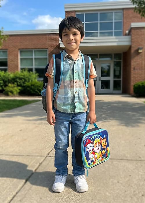 Kid wearing backpack