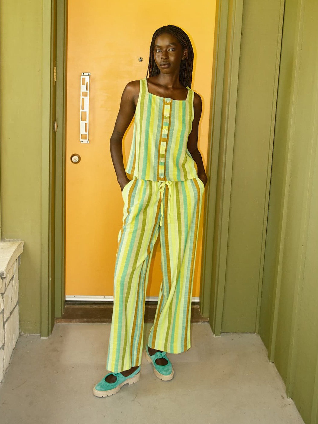 model in anu tank and leone pant in wave