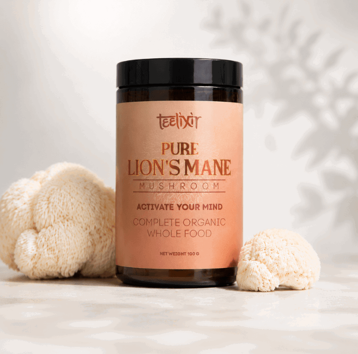 Teelixir Certified Organic Lion's Mane Mushroom Powder Pure with whole lion's mane mushroom on a warm cream background