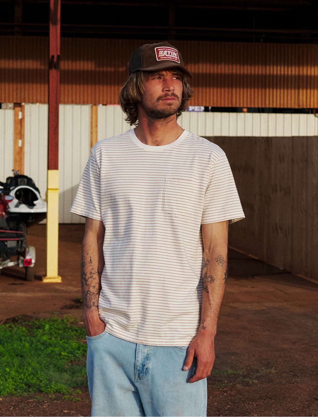 Male model wearing the Finley Pocket Tee