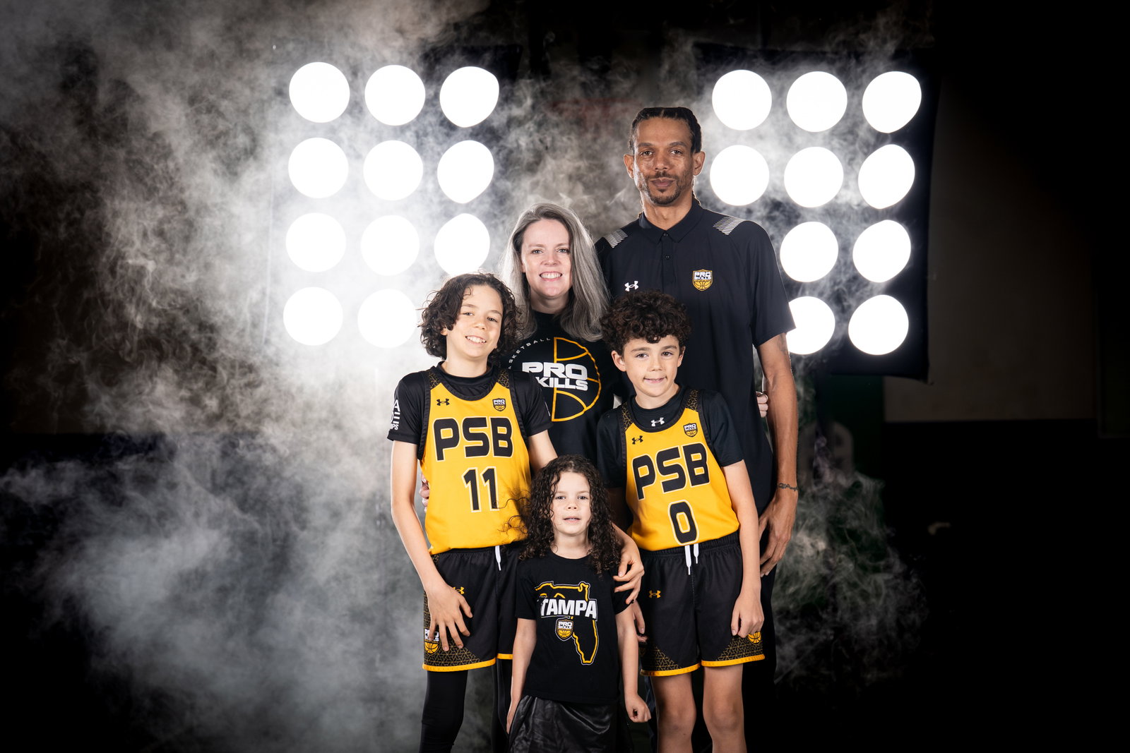 PSB coach with player and family
