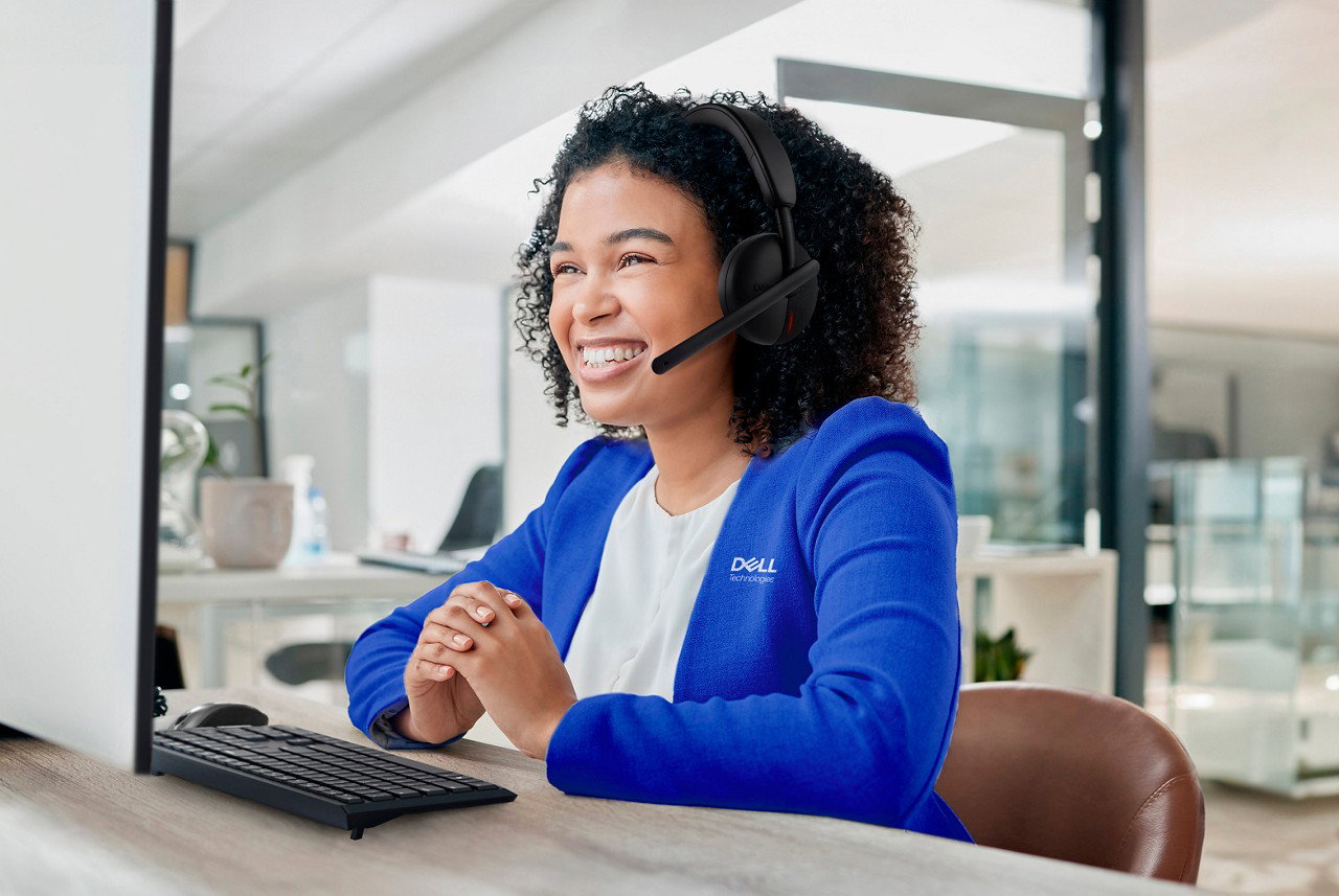 Woman, Dell call center and computer with CRM and contact us, phone call with customer service or telemarketing.