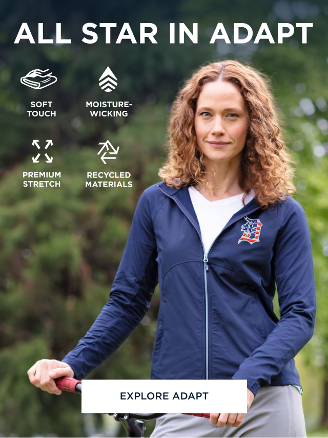 Woman wearing an Adapt Stripe quarter zip while biking | Explore Adapt