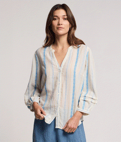 Image shows a model wearing the Judith Top in Cream/Blue. Image shows a model wearing the Romilly Top in Sun.