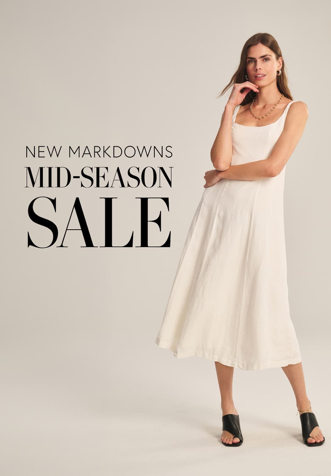 Image shows a model wearing the Austen Dress in Chalk.