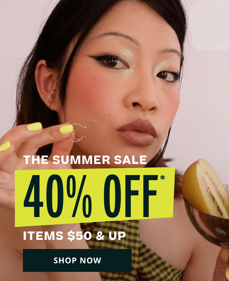 Model with thick, variety of sized silver hoop ear stack. The Summer Sale. 40% OFF Items $50 & Up. Click here to shop now