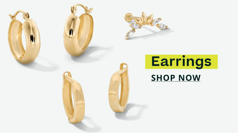 Gold chunky hoops, slim huggies & crystal crawler-style stud. Earrings. Click here to shop now