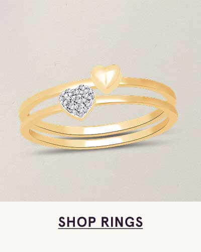 Gold double-band ring with two hearts: gold & pavé diamond-encrusted. Click here to shop rings