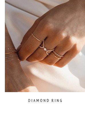 Diamond Ring - gold, geschwungen mit großem runden Diamanten in der Mitte