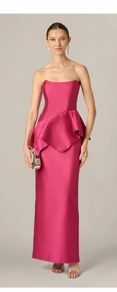 Strapless Asymmetrical Peplum Gown In Bright Rose