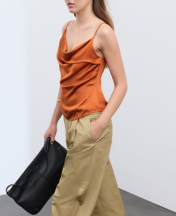 Woman wearing an Amber Satin Cowl Neck Cami Top