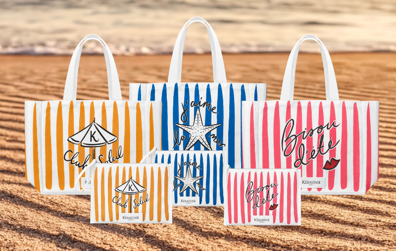 Tre shopper e pochette Kérastase a righe gialle, blu e rosa con scritte Club Soleil, J'aime la mer, Bisou d'été
