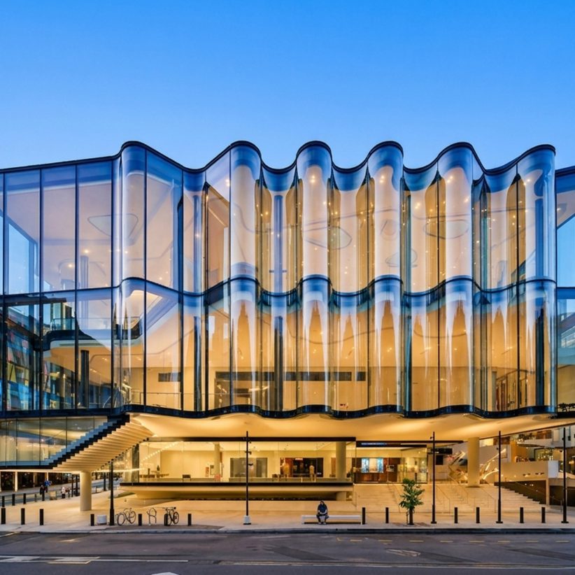 NorthGlass curved glass technology creates Glasshouse Theatre's rippling facade