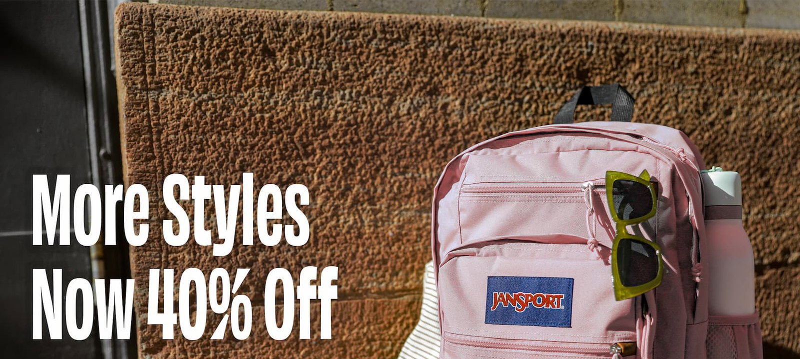 A misty rose JanSport Cool Student backpack with the text "More Styles Now 40% off"