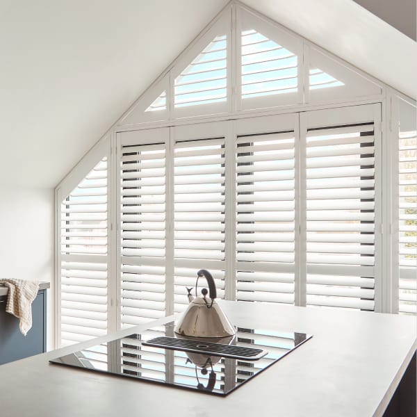 White shutters in modern kitchen with a 10-year full guarantee
