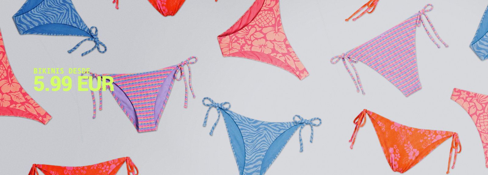 Flatlay of colourful patterned tie-side bikini bottoms scattered on a pale background with promotional text "Bikinis desde 5.99 EUR"
