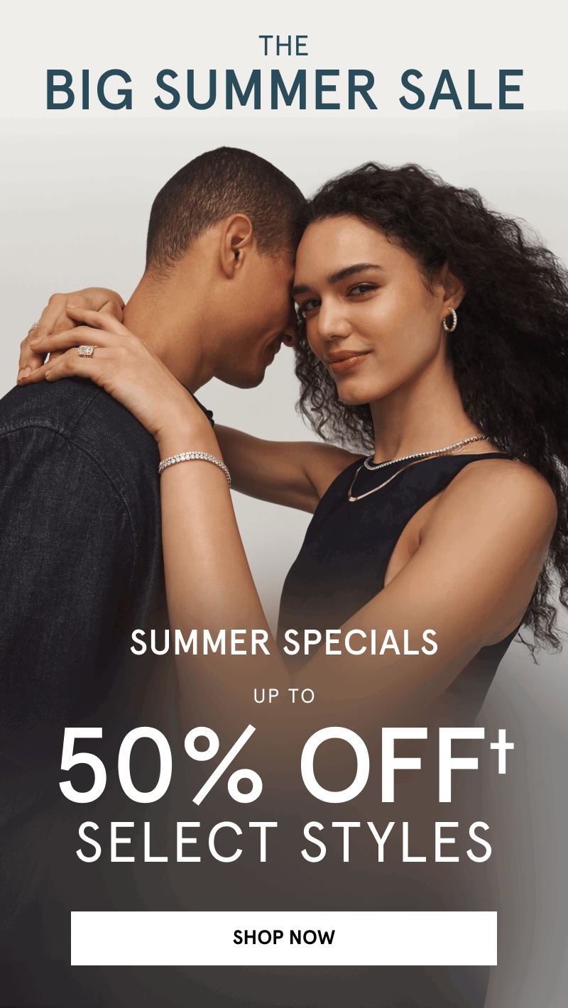 A model wearing gold diamond jewelry embraces another model. Big summer sale, up to 50% off select styles. Click to shop now