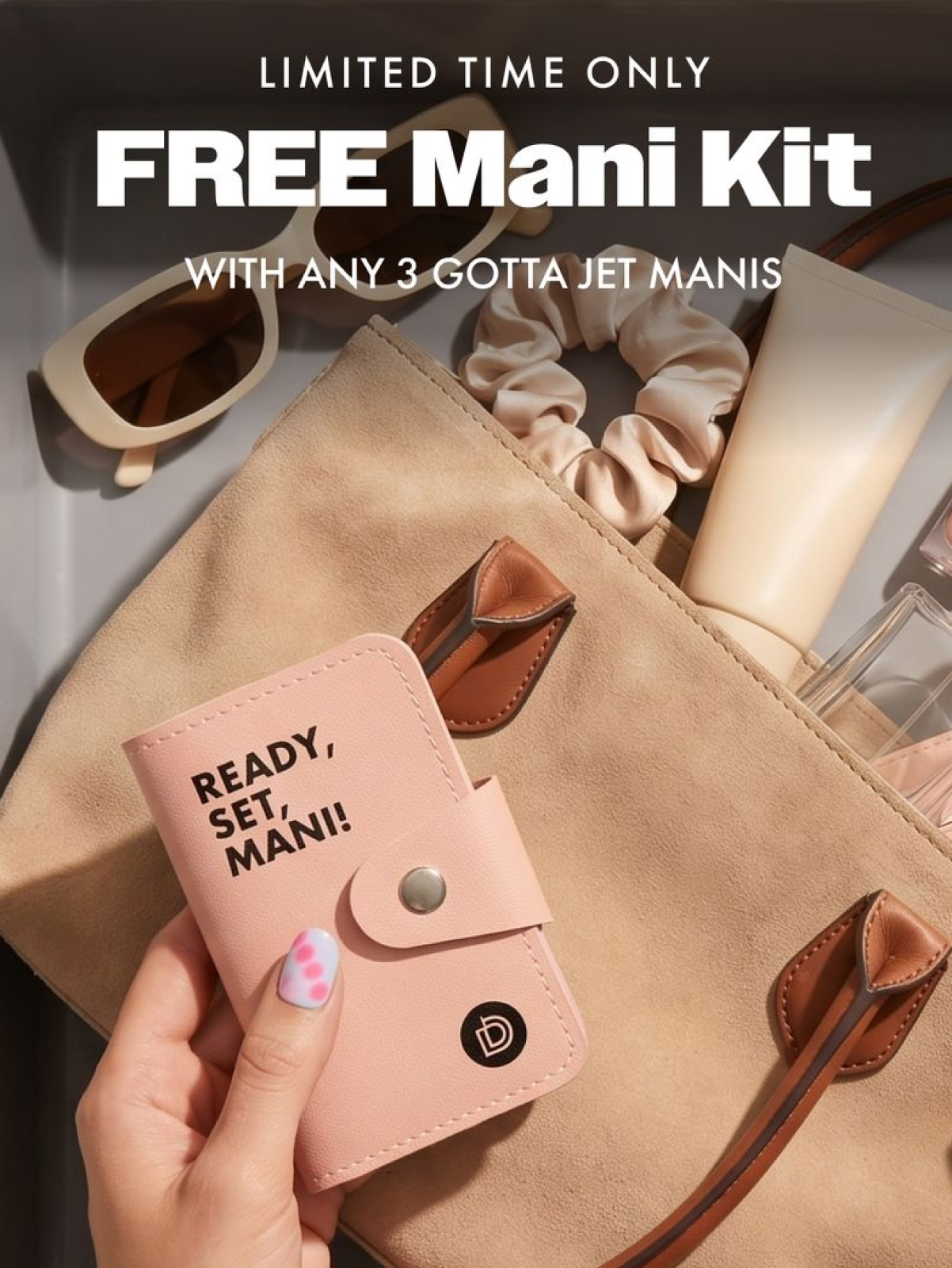 Promo graphic reading 'Limited Time Only: FREE Mani Kit with any 3 Gotta Jet Manis.' A hand with a white and pink polka-dot manicure holds a pink 'Ready, Set, Mani!' travel manicure kit with the Dashing Diva logo, set against a beach-ready flat lay of a tan tote bag, sunglasses, a scrunchie, and travel-size lotion and perfume.