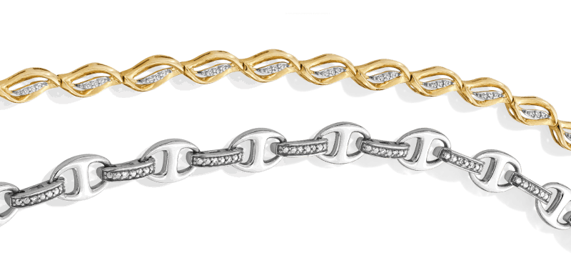 Yellow gold and white gold marquise link necklaces with diamond accents and pavé details.