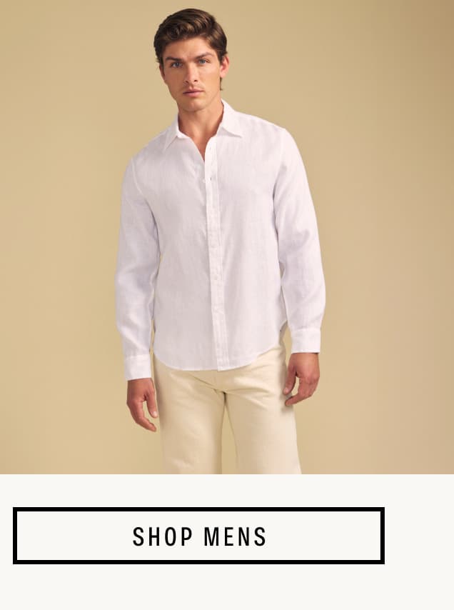 Image shows a model wearing the Caruso Top in White. Button Reads: Shop Men's Sale